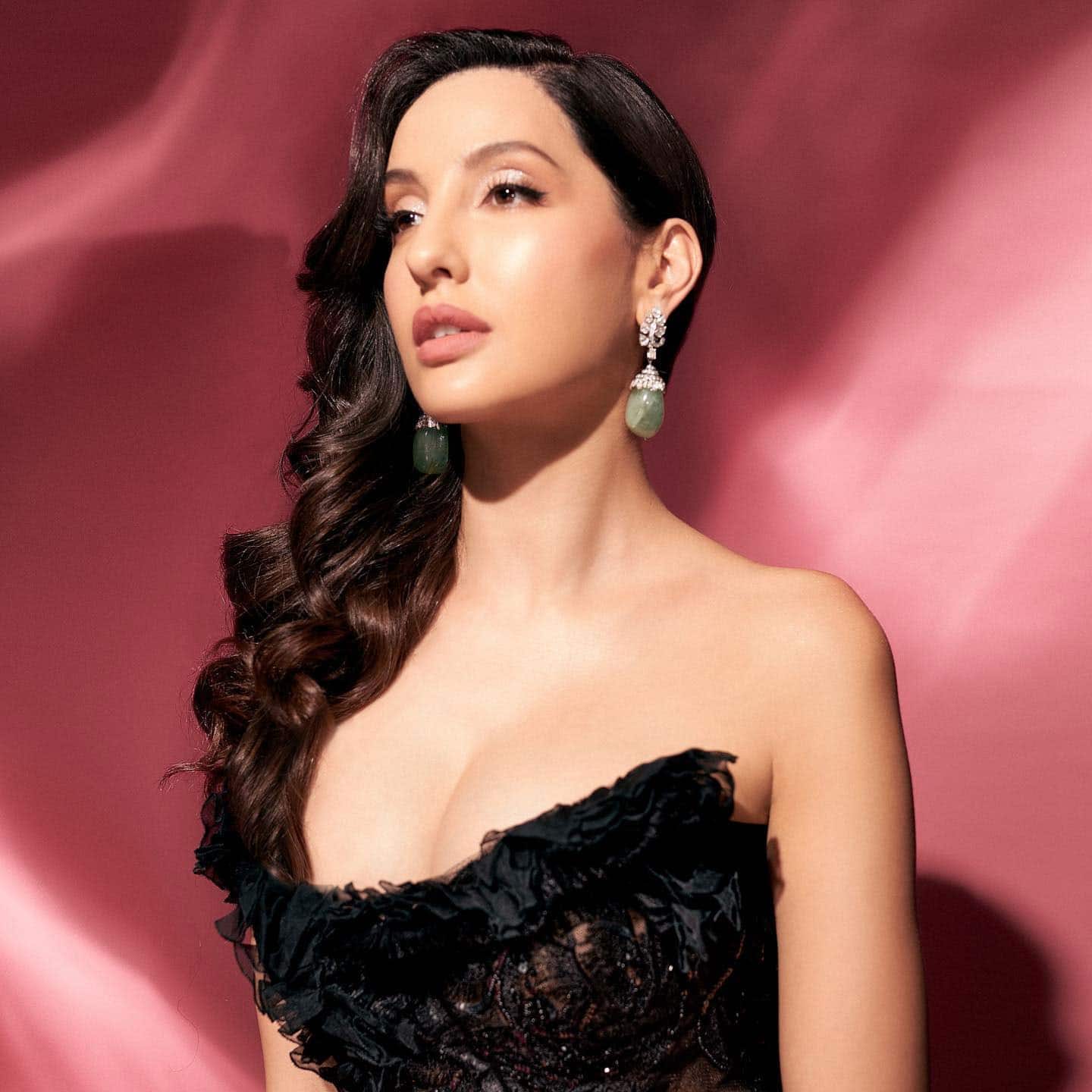 Nora Fatehi poses in a sexy photoshoot