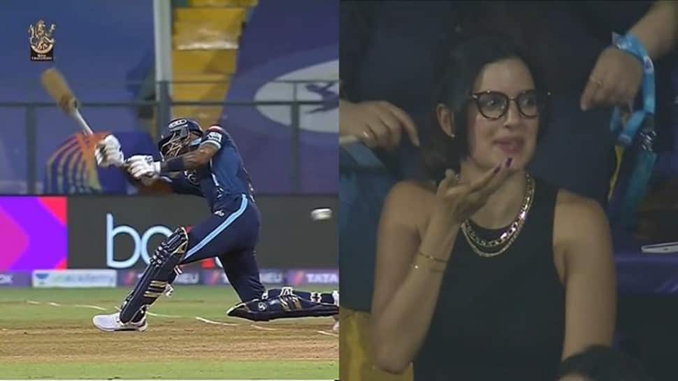 IPL 2022 RCB vs GT: Hardik Pandya&#039;s bat goes FLYING in air, wife Natasa Stankovic&#039;s SHOCKING reaction goes viral - WATCH