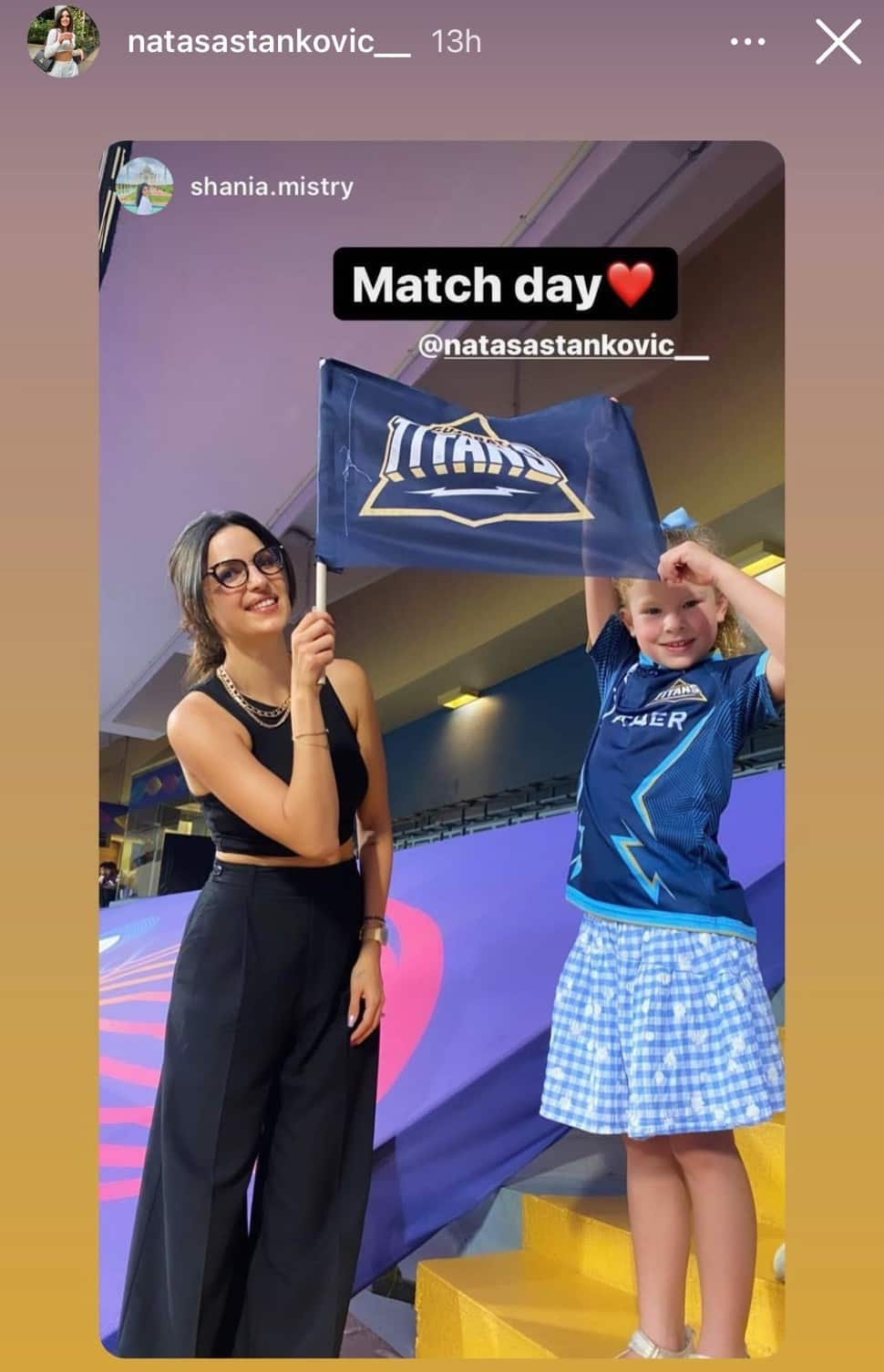 Hardik Pandya's wife Natasa Stankovic with a Gujarat Titans team member's daughter during their IPL 2022 match against RCB. (Source: Instagram)