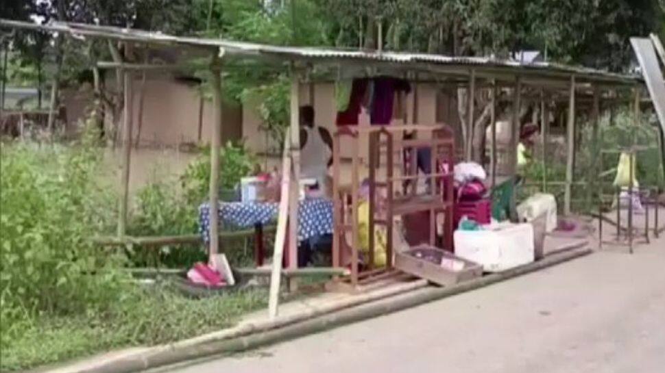 Parents use boats to bring children to primary school