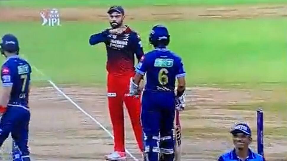 Watch: WWE fan Virat Kohli warns Shubman Gill with The Undertaker&#039;s iconic &#039;throat slash&#039; during RCB vs GT match