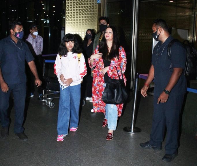 Cannes 2022: Aishwarya Rai Bachchan returns from French Riviera with Abhishek, spotted holding daughter Aaradhya's hand at airport