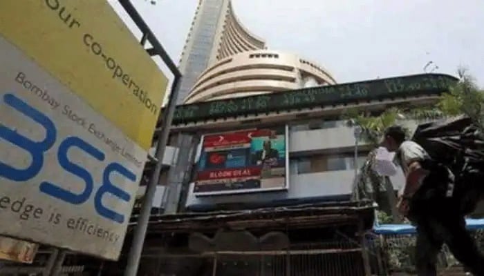 Markets reverse early gains in volatile trade; Sensex falls 236 points | Markets News | Zee News