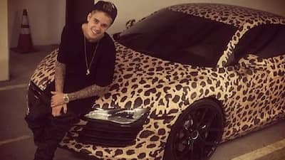 Justin Bieber with his Cheetah print Audi R8
