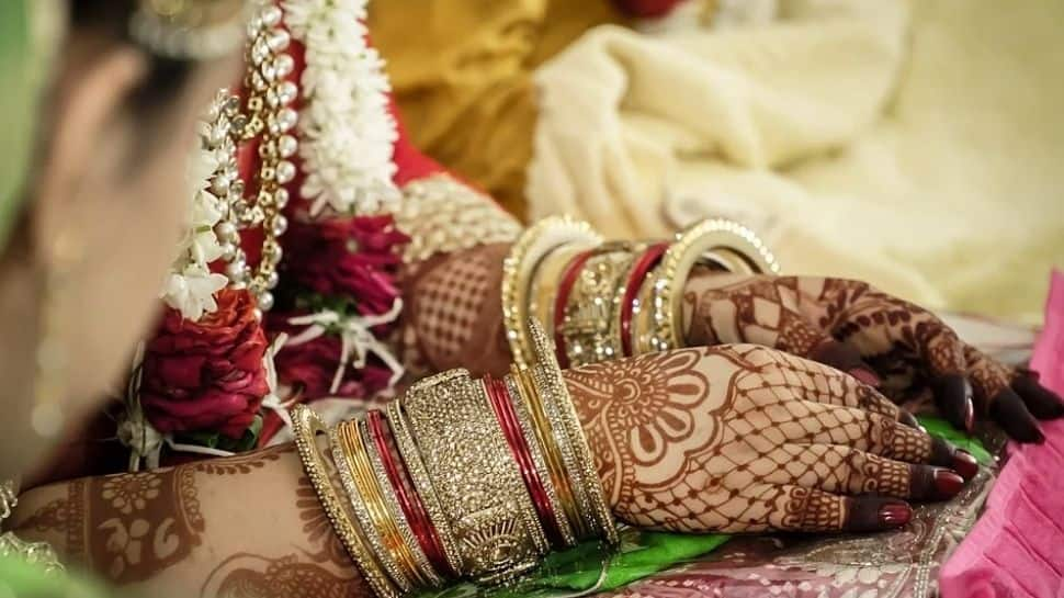 Youth Congress leader tries to remarry wife at mass wedding for Vivah Yojana benefits, gets caught!