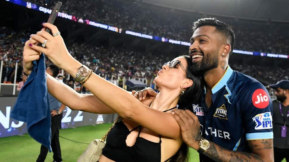 IPL 2022 Final GT vs RR: Hardik Pandya’s wife Natasa Stankovic runs on to field to hug husband after title win, WATCH