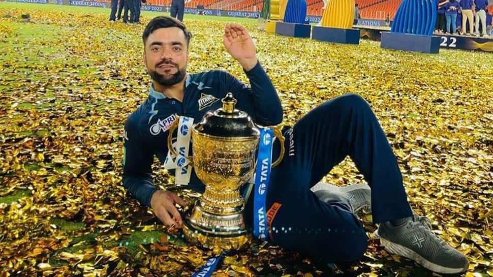 IPL 2022 Final GT vs RR: Rashid Khan falls in love with trophy, Yusuf Pathan catches up with 2008 RR teammates | Cricket News - Vimarsana News