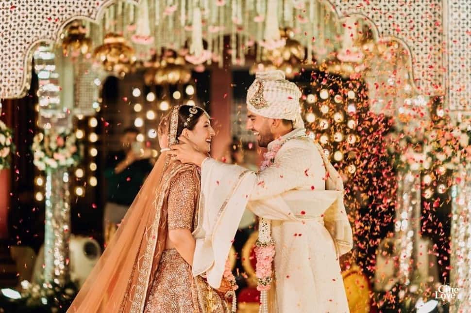Deepak Chahar exchanges garland with wife Jaya Bhardwaj during their wedding in Agra on Wednesday. (Source: Twitter)