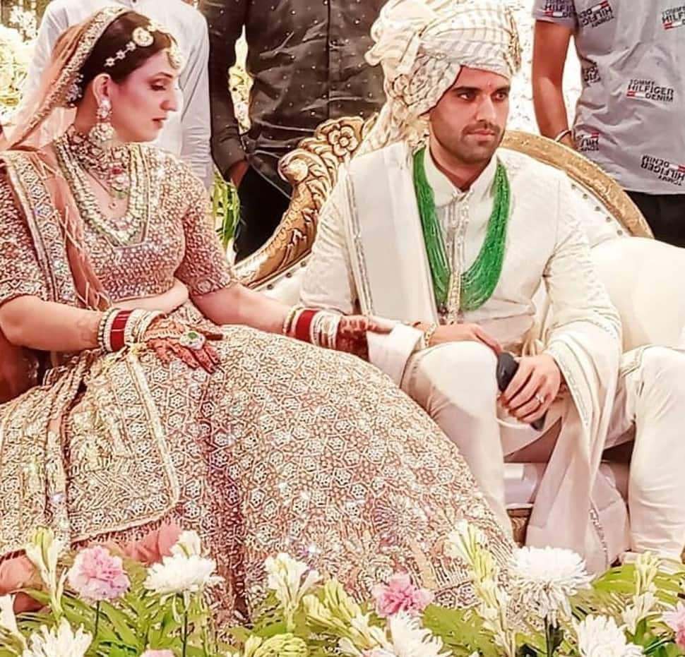 Newly-weds Deepak Chahar and Jaya Bhardwaj pose for the shutterbugs in Agra. Chahar had proposed to Jaya in Dubai after an IPL 2021 match. (Source: Twitter)