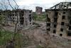 Heavily damaged residential buildings