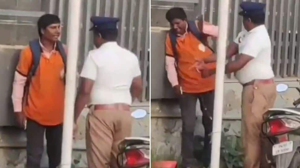 Traffic cop brutally slaps Swiggy delivery agent, snatches his phone; gets transferred - Watch