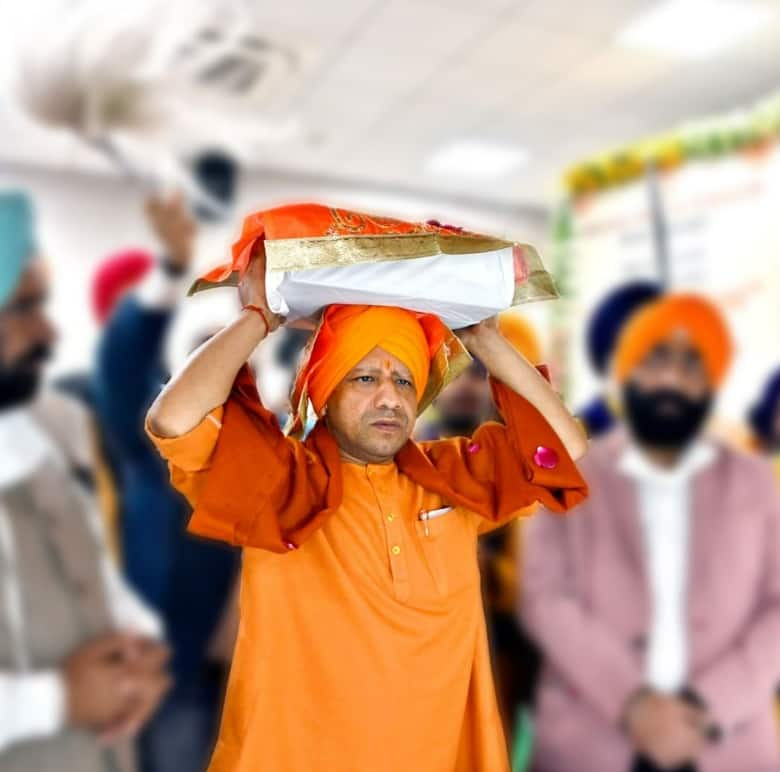 He carried the Guru Granth Sahib cloaked in a holy cloth