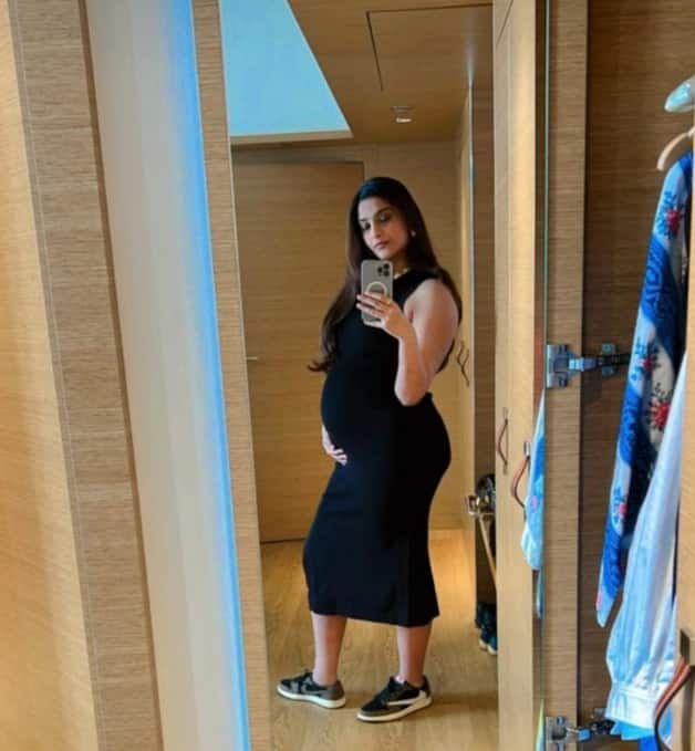 Sonam Kapoor wears a black bodycon dress with sneakers