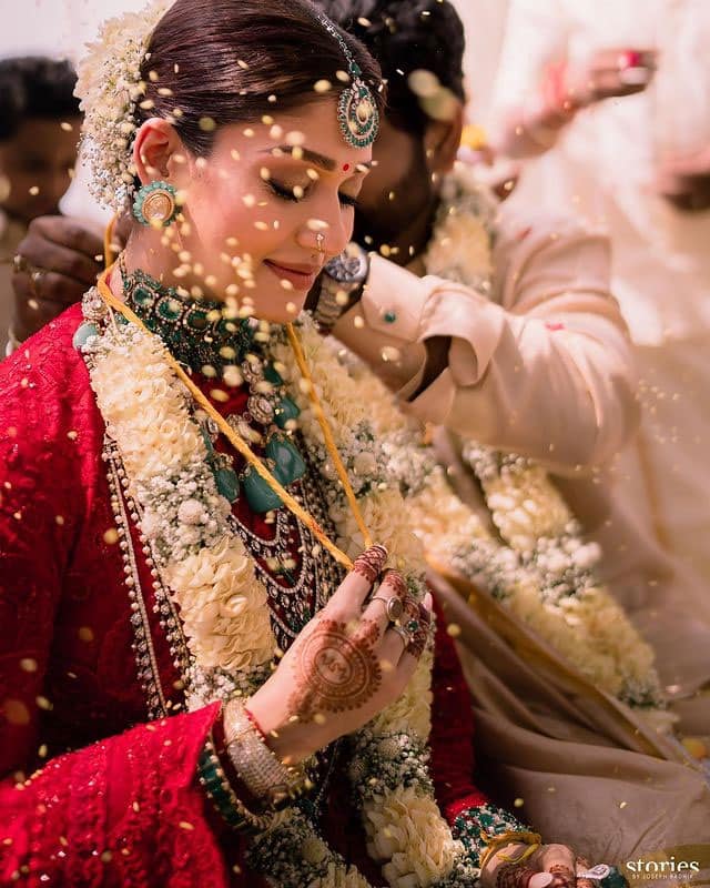 Groom Vignesh Shivan ties sacred Thali around shy bride Nayanthara's neck