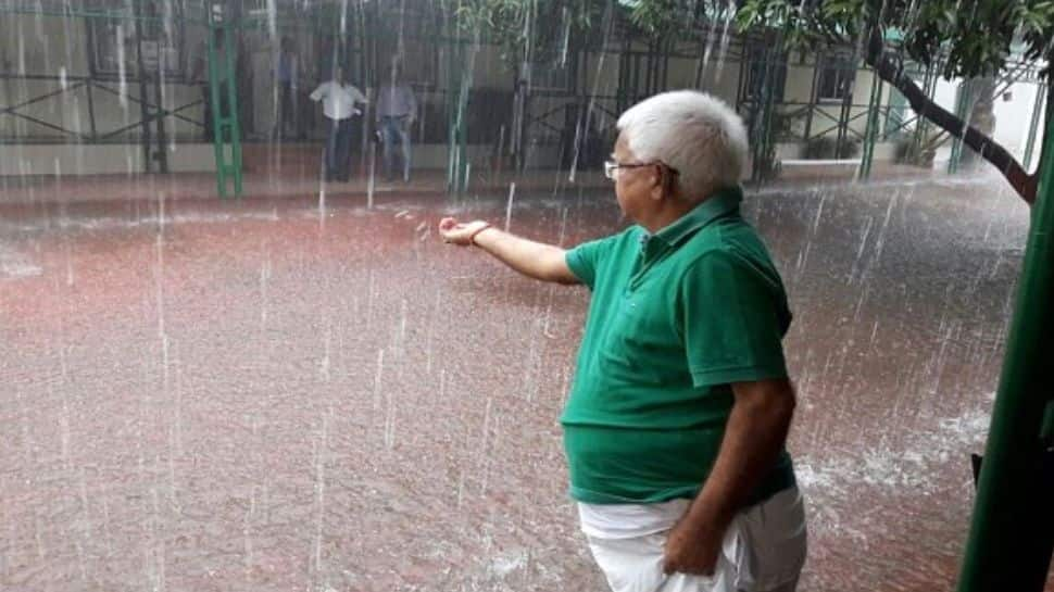 Lalu enjoys the rain