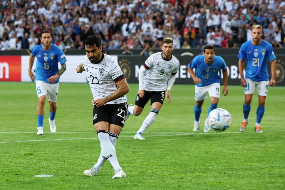 Germany's Ikay Gundogan takes a penalty against Italy in their UEFA Nations League match. Gundogan scored from the penalty spot in the fourth minute of injury time after first half. (Source: Twitter)