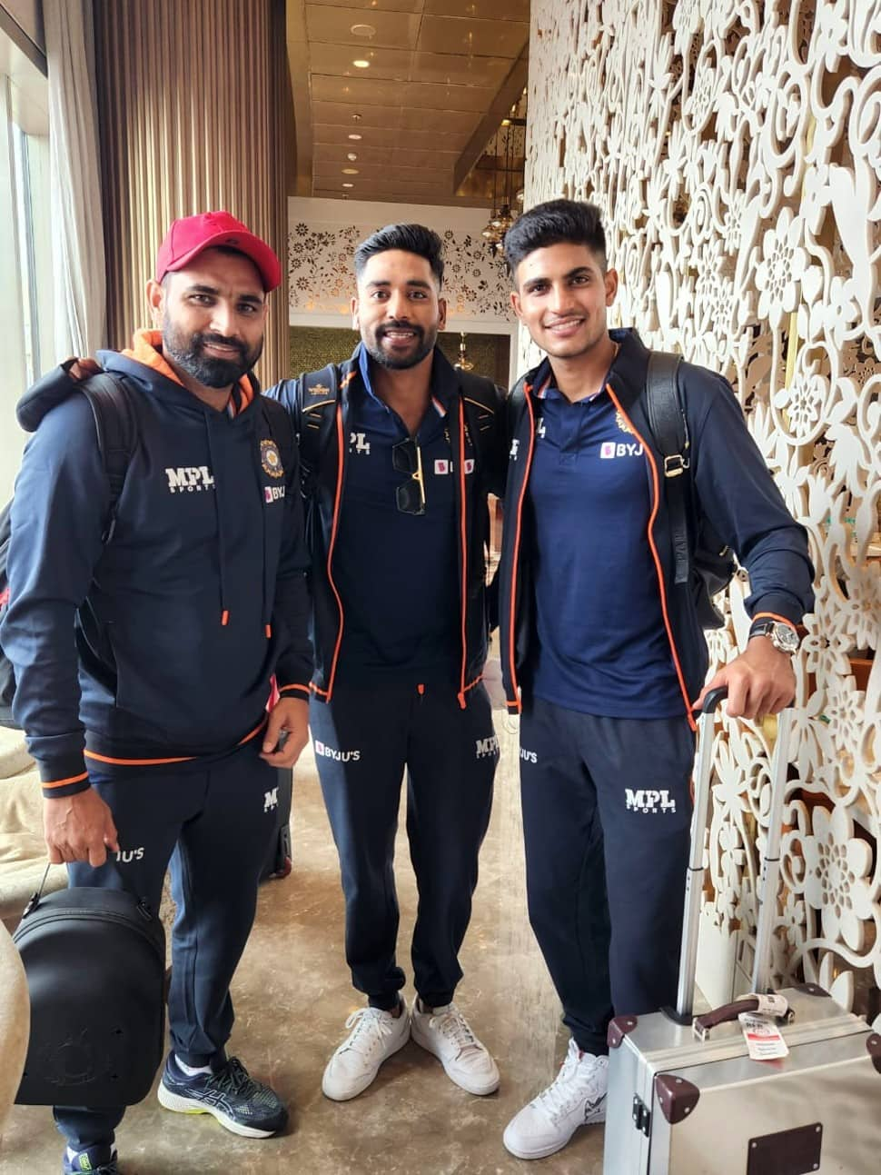 Mohammad Shami (from left) with Mohammed Siraj and Shubman Gill at the Mumbai airport before their departure for UK. (Source: Twitter)