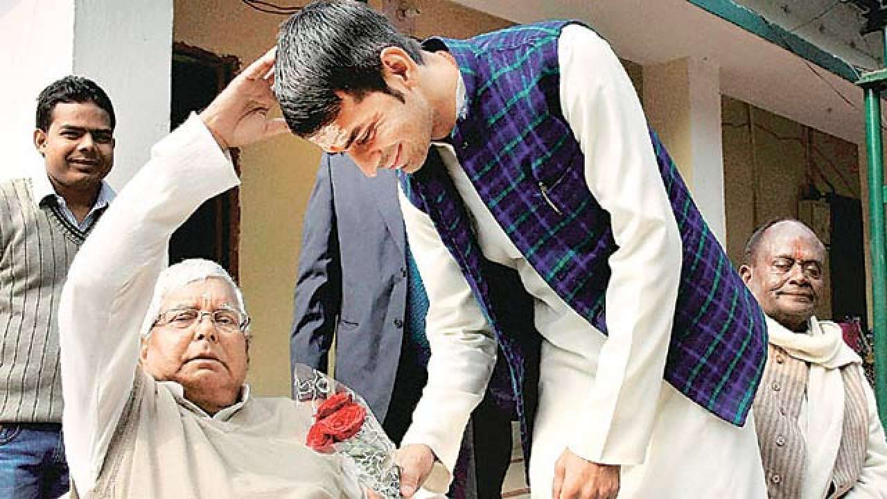 Tej Pratap Yadav with Lalu Prasad Yadav