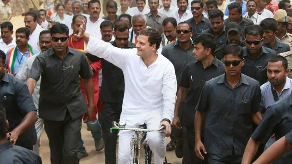 Rahul Gandhi rides a bicycle