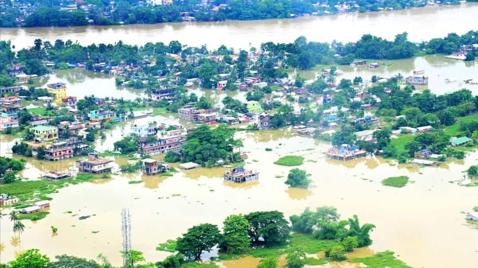 Assam floods: People take shelter on highways as houses remain inundated, over 45.34 lakh affected 