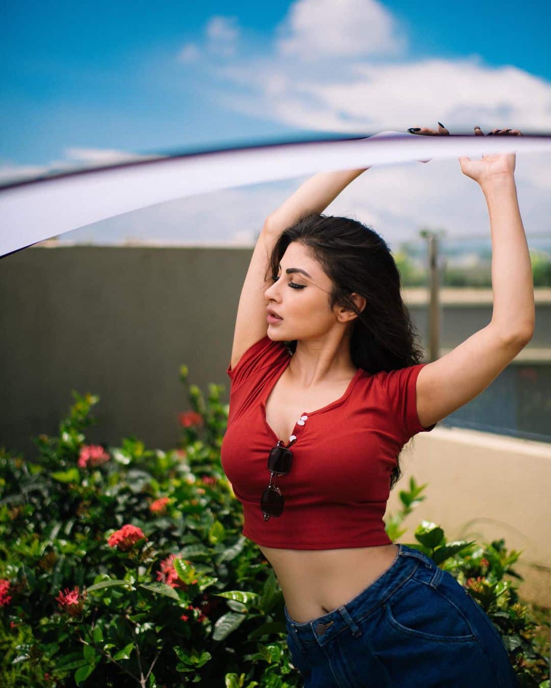 Mouni Roy Mesmerises With Her Terrace Photoshoot In Red Crop Top And Blue Jeans Pics News