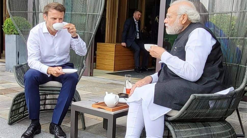 PM Modi in conversation with French President Emmanuel Macron 