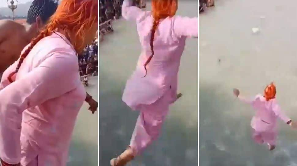 Viral Video: 70-year-old woman&#039;s RISKY stunt in Ganga river will make your heart stop! - Watch