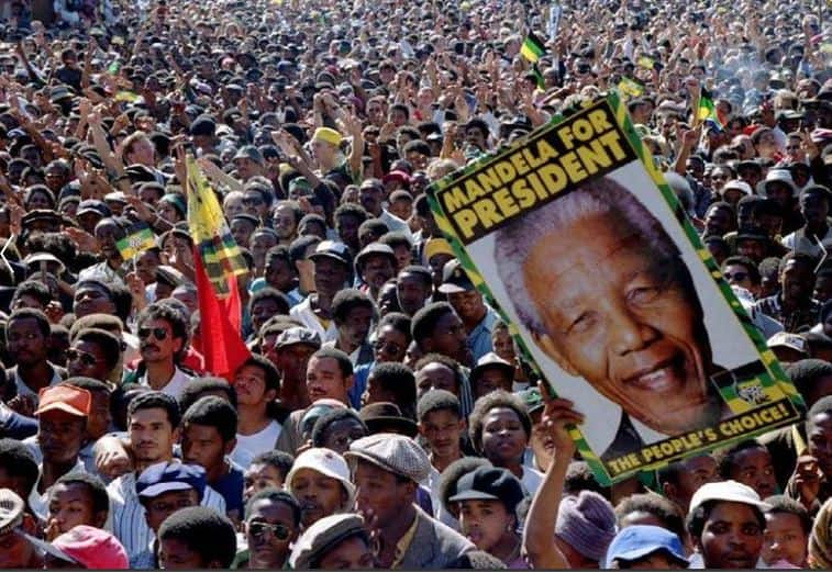 Thousands of supporters cheer Nelson Mandela