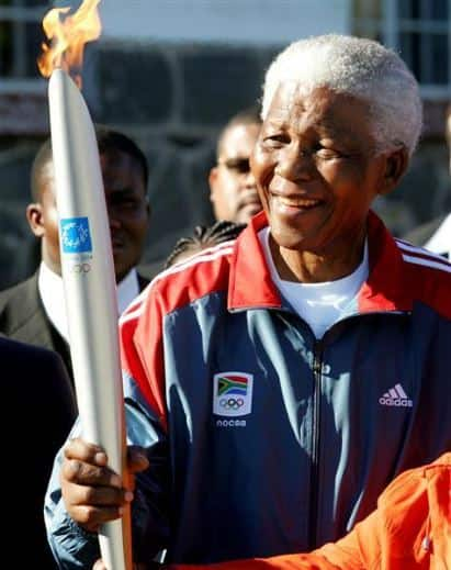 Nelson Mandela carries the Olympic Flame