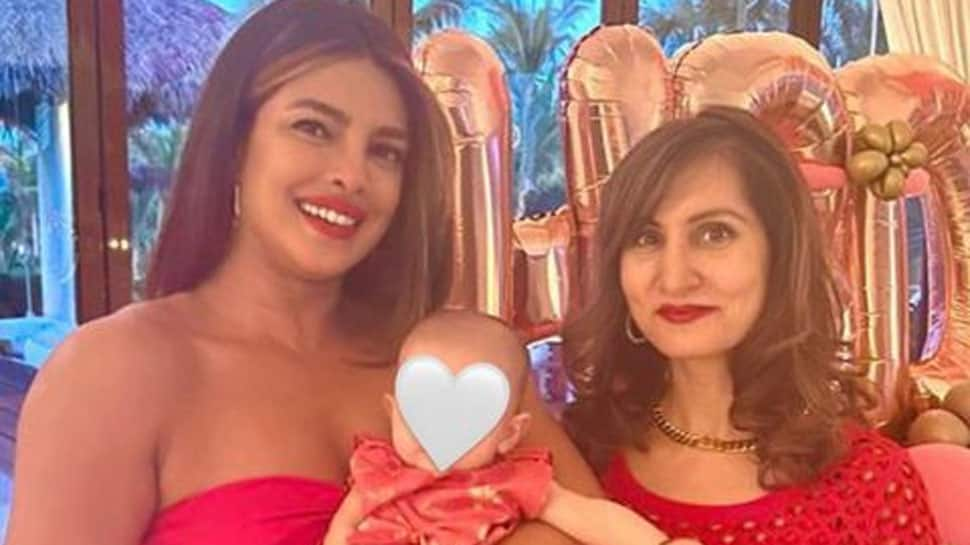 Priyanka Chopra holds daughter Malti Marie close to her heart, mommy and baby girl go twinning in red, see viral pic!