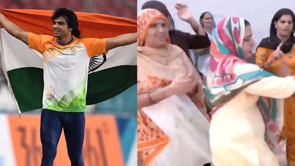 Neeraj Chopra&#039;s family celebrates his silver medal win at World Athletics Championships with dance and sweets - WATCH