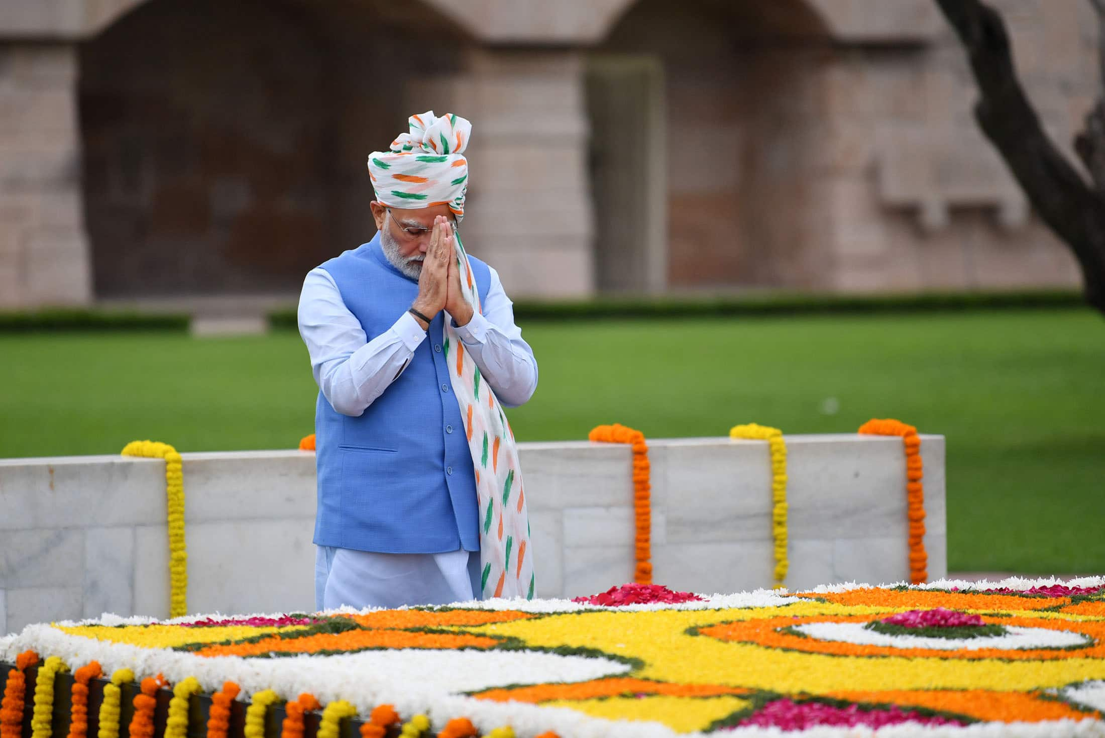 Prime Minister Modi also wore a white safa with tricolour stripes