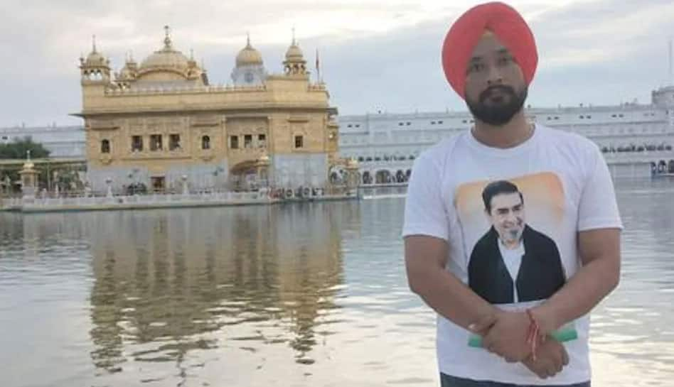 Congress worker visits Golden Temple wearing T-shirt with Jagdish Tytler&#039;s pic, angers SGPC  