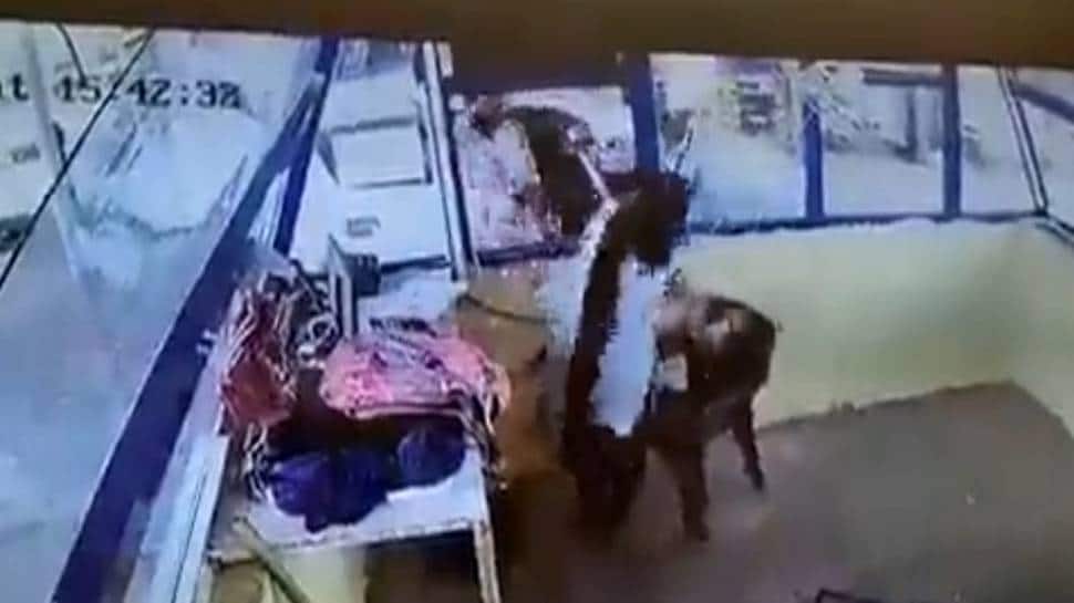 Rajgarh Viral Video: Man slaps woman toll plaza staffer, she hits him back