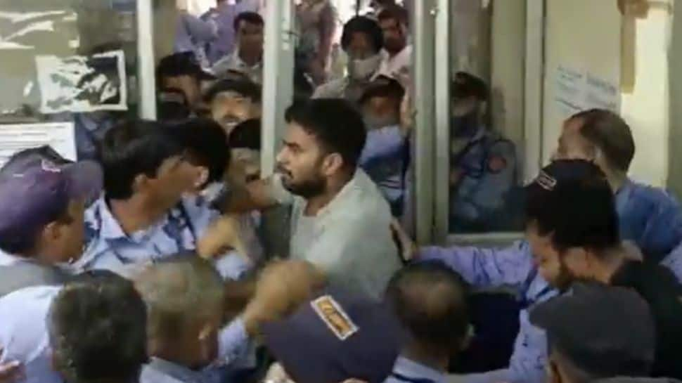 JNU students, protesting for fellowships, get into violent clash with guards - Watch