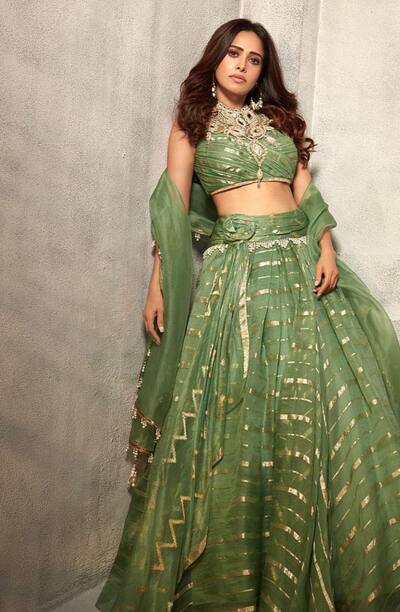 She wore a green sequel lehenga with matching blouse