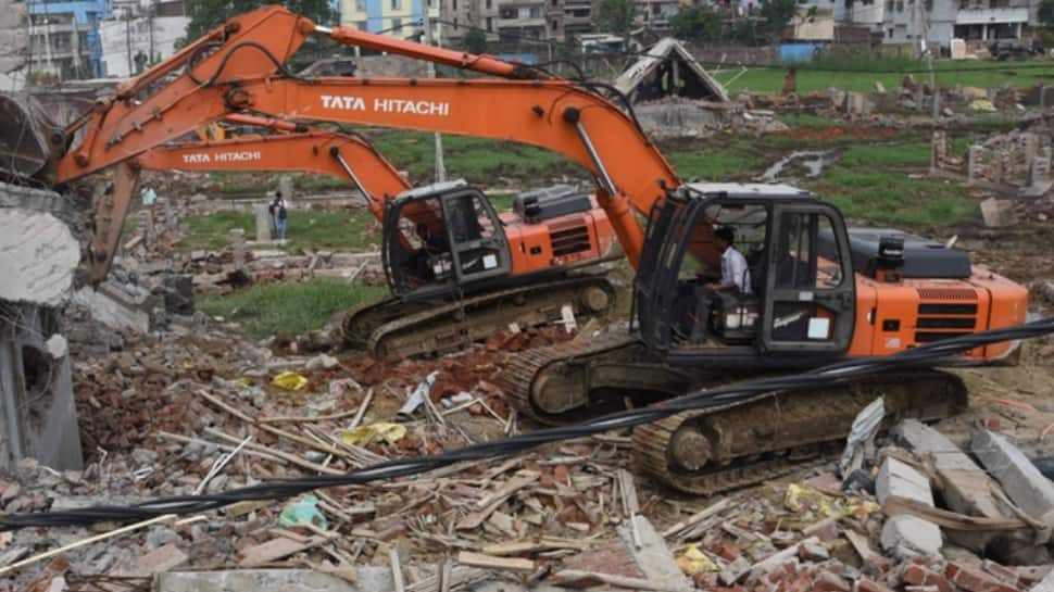 Yogi Adityanath's bulldozer razes shops outside Akhilesh Yadav's Samajwadi Party office in Lucknow