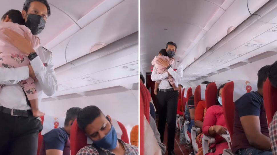 WATCH: Air India flight attendant handles crying baby like a PRO, joyous father approves Tata Group’s takeover