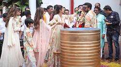 Shilpa Shetty removes husband Raj Kundra's face mask during Ganpati Visarjan