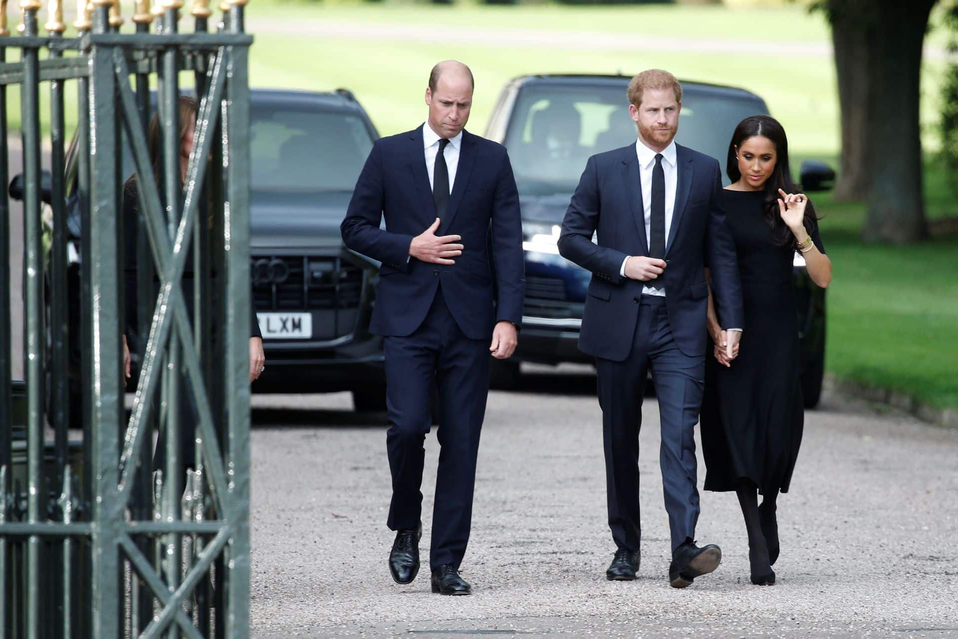 Prince William, Prince Harry and Meghan outside Windsor Castle