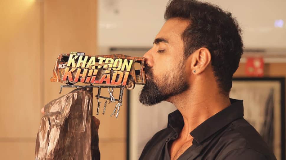 Tushar Kalia strikes a pose with &#039;Khatron Ke Khiladi 12&#039; winner trophy