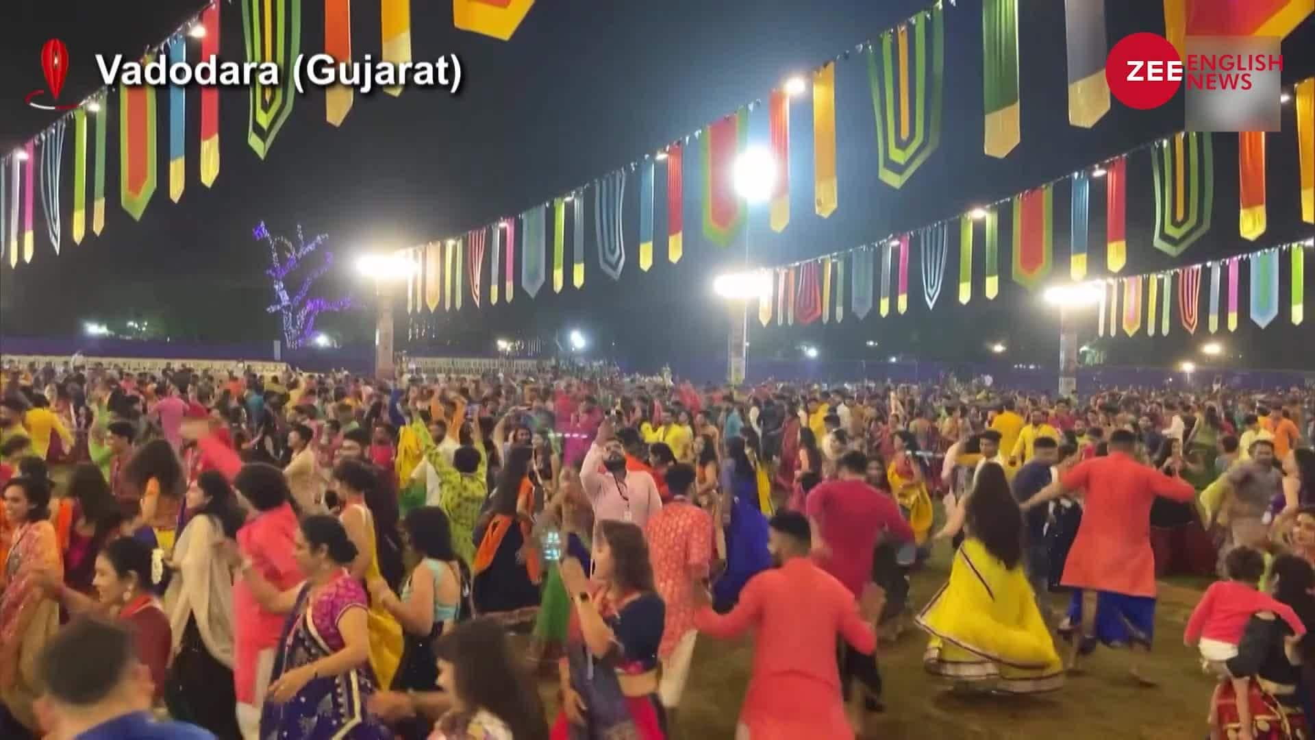 As the celebration of Navaratri began people in Vadodara perform Garba ...