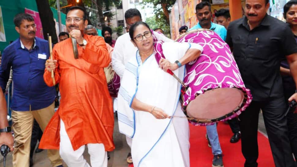 Mamata Banerjee plays ‘dhaank’ at Durga puja pandal in Kolkata – WATCH