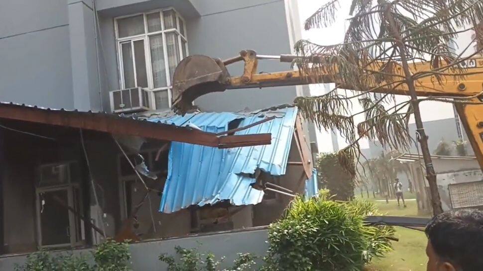 Bulldozer razes illegal enroachments in Shrikant Tyagi&#039;s Grand Omaxe society, sparks protests - Watch