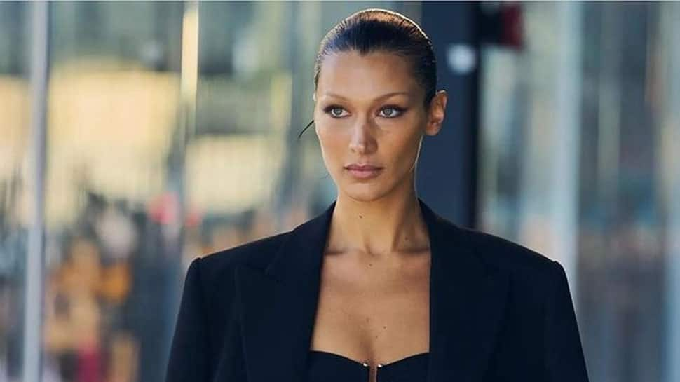 Bella Hadid Poses Topless As She Gets Spray On Dress On Runway People News Zee News