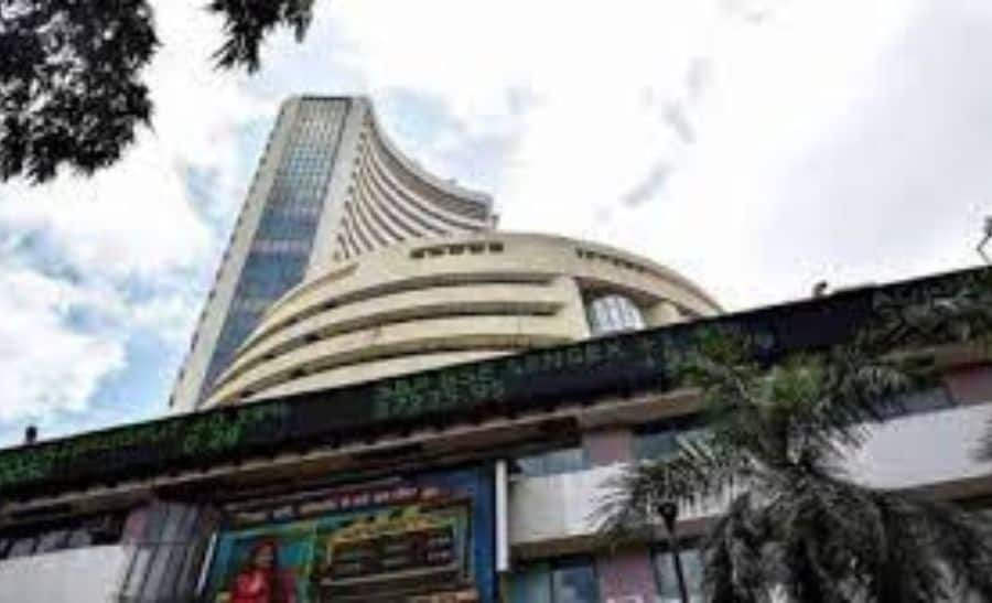 Benchmark Indexes Nifty and Sensex close in red amid choppy market; Titan share up by 5.27%