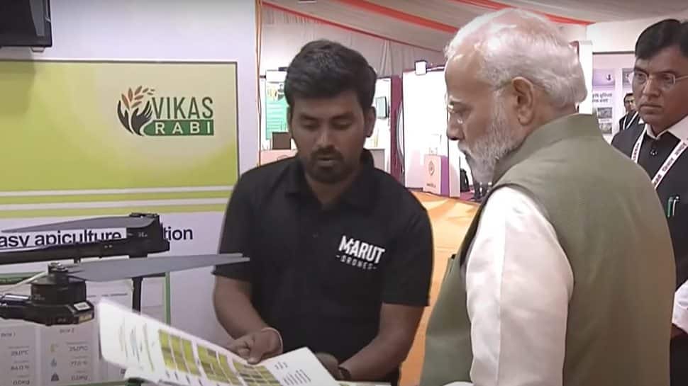 PM Modi visits Agri Startup Conclave and Exhibition pavilion; enquires about modern farming equipment