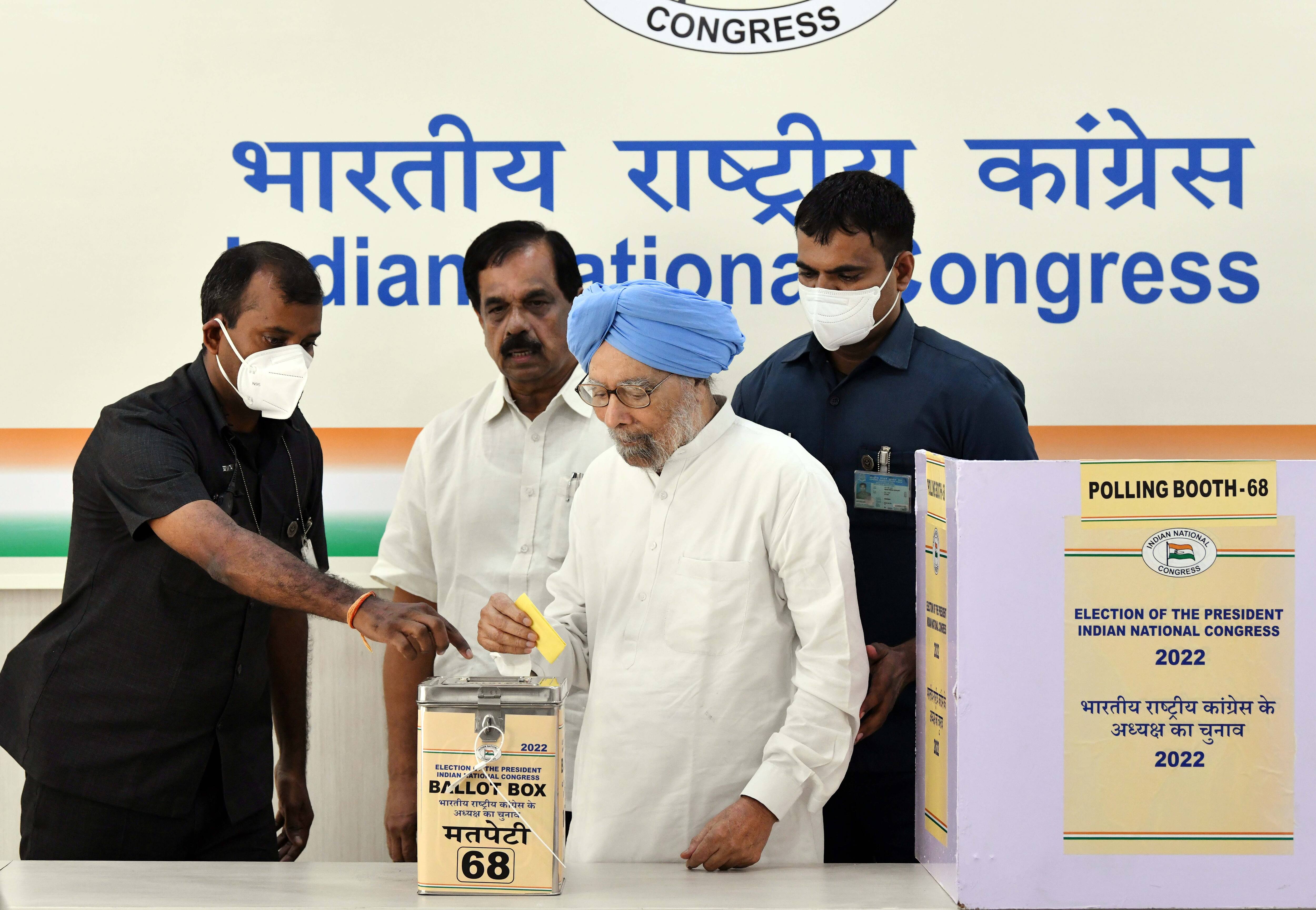 Former PM Manmohan Singh casts his vote for the Congress Presidential Election at AICC headquarters