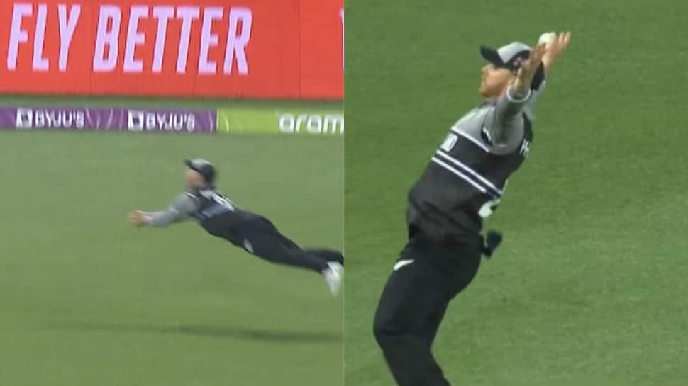 Glenn Phillips takes a SUPERMAN catch to dismiss Marcus Stoinis in AUS vs NZ match – WATCH