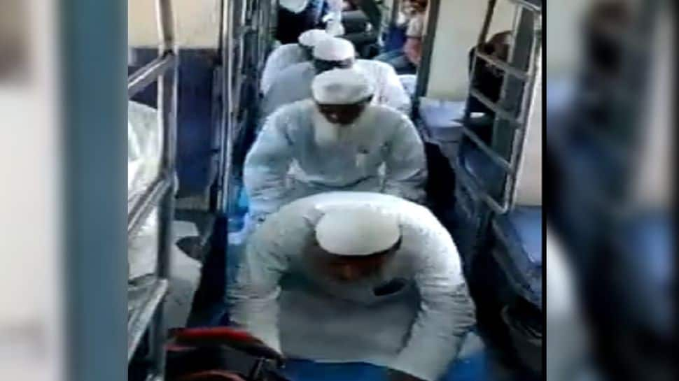 VIRAL video shows men offering Namaz inside train in UP, probe initiated